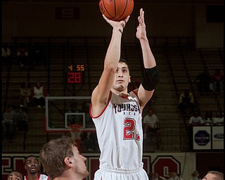 The Vindicator/Geoffrey Hauschild
YSU's Zack Rebillot completes a two point shot during the first half of a game against Geneva at Beeghley Center on Tuesday evening.
11.24.2009
