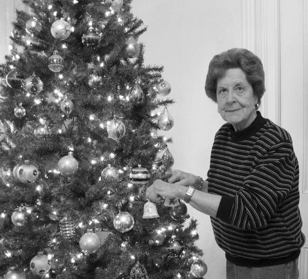 Special to The Vindicator
DECORATED: In preparation for the annual Christmas open house from 2 to 5 p.m. Dec. 6 at the Ward-Thomas Museum, 503 Brown St., Niles, Nancy Malone places one of the seasonal decorations on a Christmas tree. In addition to the tree and other holiday decorations, thousands of items will be displayed in the 14 rooms at the museum. Admission will be a donation of $5, with children under 12 admitted free when accompanied by an adult.