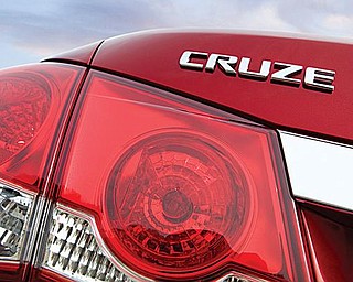 SHOWTIME COMING: The official unveiling of General Motors Corp.’s Chevrolet Cruze is Wednesday. The automotive press will be in Los Angeles to get a close-up look at the Lordstown-built, fuel-efficient small car that replaces the popular Chevrolet Cobalt.