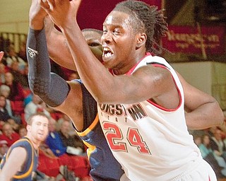 YSU's Eddie D'Haiti (24) recovers a rebound during the first half at Beeghly Center on Wednesday afternoon.