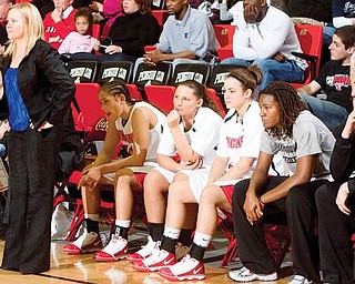 PENGUINS IN ACTION: Youngstown State women’s basketball coach Cindy Martin, standing, will lead the Penguins against No. 19 Pitt tonight at Beeghly Center.