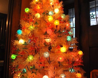 This Christmas tree at the Arms Family Museum is decorated with toys from TinkleToy Company, a division of Youngstown-based Plakie Toys, Inc. (The toys spin with the heat of the lights in the tree.)