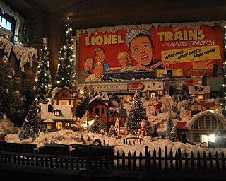 The Arms Family Museum of Local History's reception room, decorated for Christmas with a 1940s model train.