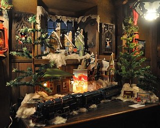 The Arms Family Museum of Local History's reception room, decorated for Christmas with a 1940s model train.