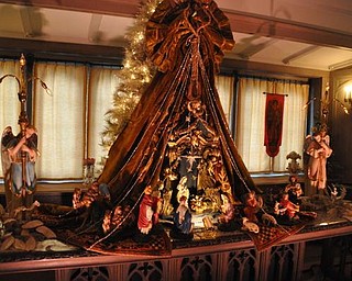 The Arms Family Museum's Library, decorated for Christmas. This nativity set is Italian papier mache.