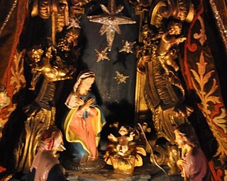 The Arms Family Museum's Library, decorated for Christmas. This nativity set is Italian papier mache.