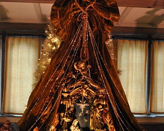 The Arms Family Museum's Library, decorated for Christmas. This nativity set is Italian papier mache.