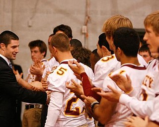 The Vindicator/Robert K. Yosay -----
Kyle McCarthy Class of 2004 State Champions Team gives them support - 1232009