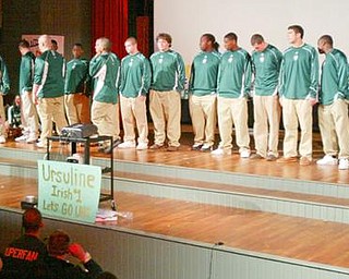 William D. Lewis/The Vindicator Ursuline coach Dan Reardon speaks at Ursuline HS pep rally Thursday.