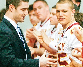 STATE CHAMP: Kyle McCarthy, a former Cardinal Mooney and current University of Notre Dame football player, wishes football players luck for their state championship game. McCarthy won a state championship with Mooney in 2004.
