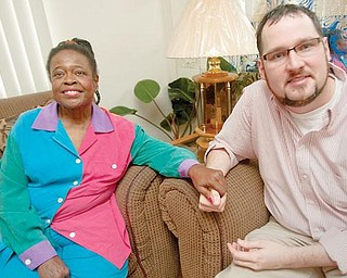 A SPECIAL GIFT: Kimberly Smith of Campbell and Jason Evans of Hubbard get together for a visit at Smith’s home on Hamilton Street. Evans donated a kidney to Smith at the Cleveland Clinic on Nov. 17.