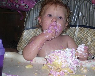 A PIECE OF CAKE! Chelsea Lynn Campbell of Youngstown celebrated her first birthday on Oct. 10. Looks like she really enjoyed it!