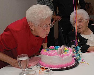 BIG DAY: Gilda Zavodni from New Middletown celebrated her 90th birthday on April 7. Looking on is her sister from Canfield,who will celebrate her 100th birthday this coming August.