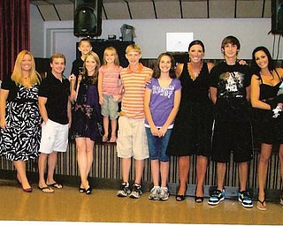 In celebration of Chrissy Toth's 30th birthday, all the Horvath family grandchildren gathered. They are Dustin Horvath, Dr. Amy Toth Dahl, Dr. Jim Horvath, Joshua Horvath, Dr. Mikhi Horvath, Rachel Horvath, Jacob Horvath, Becky Horvath, Chrissy Toth, Colton Horvath, Ashley James and great grandchild Fallon James.