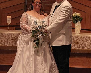 Mr. and Mrs. Brian Orzechowski of Youngstown were married Sept. 26.