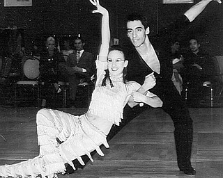 Special to The Vindicator
HAVING A BALL: Leesha Thompson, 17, a daughter of Mitch and Pamela Thompson of Vienna, recently competed in the 2009 National Dance championships in Orlando, Fla., where she received first-place awards for her Samba, Paso Doble, Hustle, Waltz, Viennese Waltz and Tango, and second-place awards for her Rumba, Cha Cha, East Coast Swing and Mambo. Leesha, who is shown above as she completed one of the required dance routines with her partner, Travis Manero, also received a gold first-place award for her showcase dance. The Mathews High School senior, who represented the Youngstown Fred Astaire Dance Studio in the competition, is enrolled in the animal management program at Trumbull Career and Technical Center.
