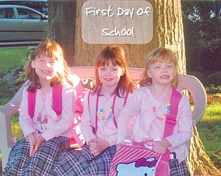 Their first day of school at Watson Elementary in Austintown was a big deal for Moira, Emma and Gretchen George.