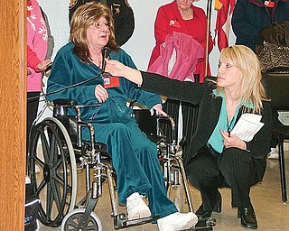 FINALLY OVER: Mary Jane Heiss, left, mother of murder victim Tami Engstrom, discusses the execution of Kenneth Biros at the Southern Ohio Correctional Facility in Lucasville as prisons spokeswoman Julie Walburn holds the microphone.