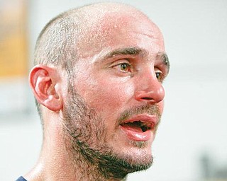 GETTING READY: Boxer Kelly Pavlik takes a break during a workout this week. The Youngstown
fighter is preparing to box Miguel Espino on Dec. 19 at Youngstown State University’s Beeghly Center.