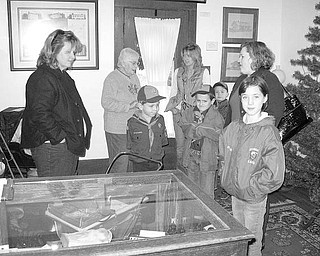 Special to The Vindicator
HISTORY LESSON: Cub Scouts visit the Hubbard Historical Society’s McBride House accompanied by their moms. Left to right are Beth Krlich; Cecilia Cooper, the society president; Laura Yoder; and Stacey Stafford, leader.