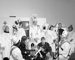 Special to The Vindicator
ORTHODOX CELEBRATION: The sixth annual pageant for Velija/Holy Supper will showcase the Christmas Eve customs and traditions of the Carpatho-Rusyn people. The event will take place at St. Nicholas Orthodox Church Social Hall, 2053 North Road in Warren. This year’s festivity, which begins at 4 p.m. today, will be highlighted by the Carpatho-Rusyn Society members and will include a dinner consisting of 12 traditional foods. During the festivities at Velija, St. Nicholas will give out golden coins. Ethnic items will for sale, and the singing of Christmas carols will round out the event. Many door prizes will be drawn, and entertainment will be provided by the Balalaika Ensemble from St. Nicholas Orthodox Church in Mogadore. For more information, visit www.c-rs.org. To reserve a place, call one of the following Carpatho-Rusyn Society members: Jim Basista, president, at (330) 544-0107; Robert Democko, vice president, (330) 758-1287; Michael Vasilchek, secretary, (330) 755-6883; or Tom Maley (Mlej), treasurer, (330) 530, 5028. Tickets will be for sale at the door. Prices are adults $15, and children, $7.50. Above is an image of a previous Velija.