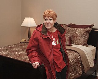 The Vindicator/Lisa-Ann Ishihara-- Lisa Kaluza  reacts to seeing her bedroom in their new house. Sunday December 13, 2009