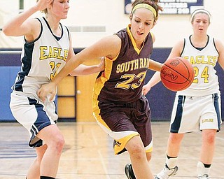 South Range's Gabrielle Naples (23) against United Ruth Prosko (30)