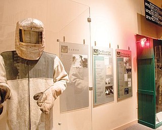 ON DISPLAY: This exhibit at the Youngstown Historical Center of Industry & Labor on Wood Street showcases steel-working safety equipment. A changeover in management of the center, commonly known as the steel museum, was discussed Monday night.