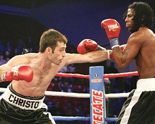 Campbell High graduate Christos Hazimihalis wins his pro debut at YSU's Beeghly Center Dec. 19, 2009 as part of the undercard for the Kelly Pavlik title fight.