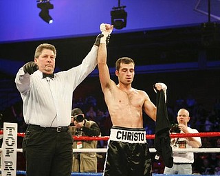 Campbell High graduate Christos Hazimihalis wins his pro debut at YSU's Beeghly Center Dec. 19, 2009 as part of the undercard for the Kelly Pavlik title fight.