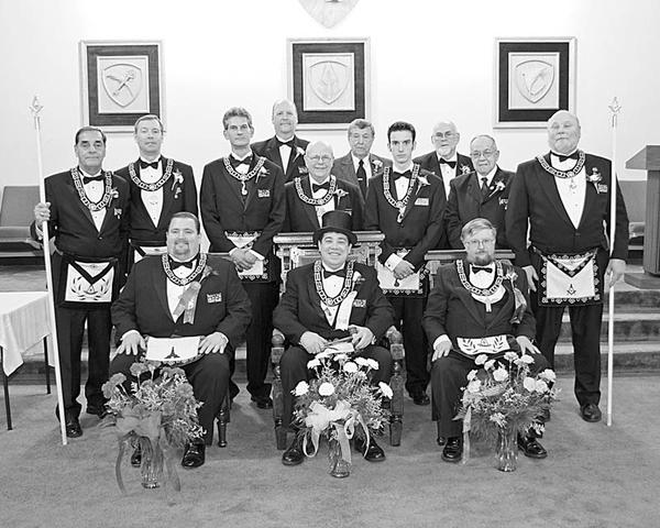 Special to The Vindicator
OFFICIAL CEREMONY: At its Dec. 11 meeting in Canfield, Argus Lodge 545 F&AM installed elected officers for 2010 during its 124th annual installation ceremony. Worthy Brother Russell W. Gillam III served as master of ceremonies. He was aided by the installing officers, worthy brothers Russell W. Gillam Jr., Terry Crosby Jr., Donald L. Huntley, Dale E. Hawkins, Christopher Brocious, George E. Brainard and Paul L. McGraw and brothers Joe Ault and Jared Clark. The new officers, seated from left to right, are Brother Richard Percic, senior warden; Worthy Brother R. Christopher Gillam, master; and McGraw, junior warden. Standing, from left, are Gillam Jr., senior deacon; Gillam III, treasurer; Brother Mark Roca, senior steward; Brother Denny Furman, lodge education officer; Worthy Brother Lyle K. Orr Jr., chaplain; Brother John Factor, trustee; Brother Jeffery Rober, junior steward; Huntley, secretary; Worthy Brother Henry Fletcher, tyler; and Brother David Giudici, junior deacon. The meeting was preceded by refreshments served by the Masters family. Argus Lodge, chartered in Canfield in 1886, is among the 540 lodges under the Grand Lodge of Ohio. For more information and photos, visit www.arguslodge.org.