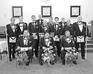 Special to The Vindicator
OFFICIAL CEREMONY: At its Dec. 11 meeting in Canfield, Argus Lodge 545 F&AM installed elected officers for 2010 during its 124th annual installation ceremony. Worthy Brother Russell W. Gillam III served as master of ceremonies. He was aided by the installing officers, worthy brothers Russell W. Gillam Jr., Terry Crosby Jr., Donald L. Huntley, Dale E. Hawkins, Christopher Brocious, George E. Brainard and Paul L. McGraw and brothers Joe Ault and Jared Clark. The new officers, seated from left to right, are Brother Richard Percic, senior warden; Worthy Brother R. Christopher Gillam, master; and McGraw, junior warden. Standing, from left, are Gillam Jr., senior deacon; Gillam III, treasurer; Brother Mark Roca, senior steward; Brother Denny Furman, lodge education officer; Worthy Brother Lyle K. Orr Jr., chaplain; Brother John Factor, trustee; Brother Jeffery Rober, junior steward; Huntley, secretary; Worthy Brother Henry Fletcher, tyler; and Brother David Giudici, junior deacon. The meeting was preceded by refreshments served by the Masters family. Argus Lodge, chartered in Canfield in 1886, is among the 540 lodges under the Grand Lodge of Ohio. For more information and photos, visit www.arguslodge.org.