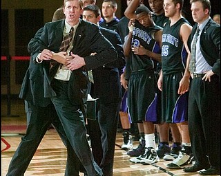 The Vindicator/Geoffrey Hauschild
High Point University's Head Coach Scott Cherry yells after disagreeing with a ?foul during the second half of a game at Beeghley Center on Tuesday evening.