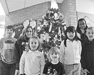 Special to The Vindicator
ST. PATRICK SCHOOL: Students at St. Patrick School in Hubbard got into the holiday spirit by collecting $200 to be donated to the Cystic Fibrosis Foundation to help those who are suffering from the disease. Participating in the project are, above from left, Daniel Robinson , Kelly Wylodsky, Katie Cioggle, Jayden Johnson, Samantha Rosser, Maryam Dennis and Daniel Yoder.