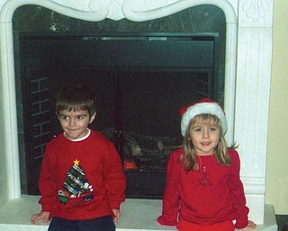 Nathan Richley of Poland and Olivia Tondy of Struthers were holiday guests at the home of their grandma, Paulette DiLullo of New Middletown.