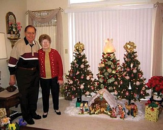 Joseph and Valeria Demidovich of Boardman, who have been married for 60 years, celebrate the holidays with three trees!