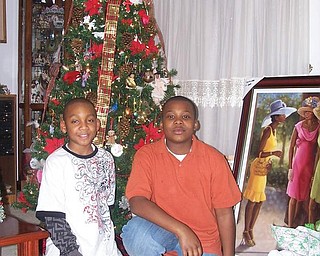 Sandra Allen-Bowman of Youngstown was visited by her grandsons, Patrick Allen Jr., left, and Steven Allen Jr., on Christmas Eve.