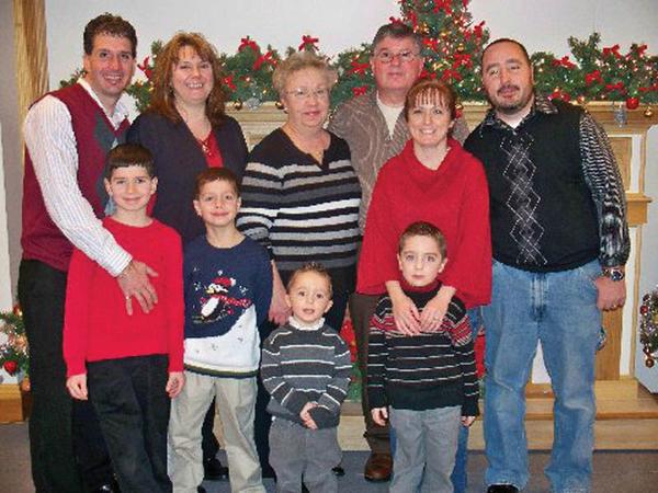 The Pappagallo family includes: left, Andy Jr., Carrie and their sons, Matthew, 8 and Jacob, 6; middle, Sandy and Andy Sr. (grandma and grandpa); and right, Natalie, Tim Sr. and their sons, Dominic, 3, and Tim Jr., 5.
