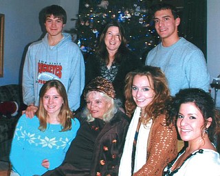 Joanne Speece of Canfield, seated, is surrounded by her grandchildren, seated from left, Leanna Hartsough of Canfield, Angela Speece of Boston and Jessica Speece of North Jackson, and, standing from left, Aaron Hartsough, great-grandson, Heidi Van Auker of Canfield and Billy Speece of North Jackson.