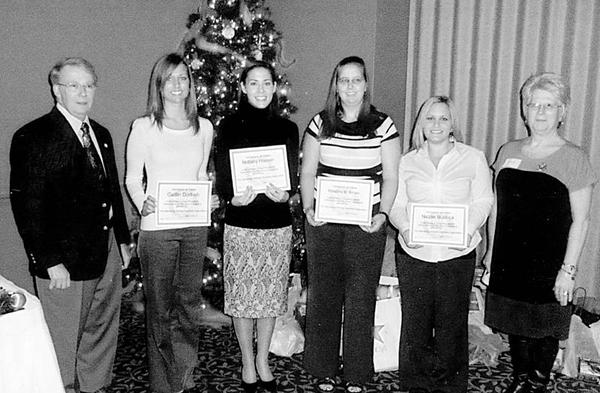 Special to The Vindicator
FUTURES IN EDUCATION: The Mahoning Retired Teachers Association met Dec. 10 at Antone’s Banquet Centre in Boardman. Four senior education majors from Youngstown State University received awards of $1,000 each. From left to right are MRTA President Robert Thomas, Caitlin Dorbish, Brittany Hopper, Khristine Krcelic, Nicole Burlock, and Bernadette Hogg, the scholarship chairwoman.