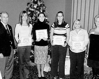 Special to The Vindicator
FUTURES IN EDUCATION: The Mahoning Retired Teachers Association met Dec. 10 at Antone’s Banquet Centre in Boardman. Four senior education majors from Youngstown State University received awards of $1,000 each. From left to right are MRTA President Robert Thomas, Caitlin Dorbish, Brittany Hopper, Khristine Krcelic, Nicole Burlock, and Bernadette Hogg, the scholarship chairwoman.