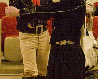 The Vindicator/Lisa-Ann Ishihara ---
Richard and Donna Best of Cuyahoga Falls perform the Black Lightning Wild West Show
on the second floor of the Masonic Temple during First Night Youngstown 2010