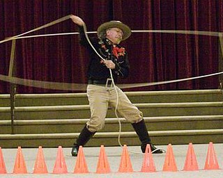 The Vindicator/Lisa-Ann Ishihara ---
Richard Best of Cuyahoga Falls performs the Black Lightning Wild West Show
on the second floor of the Masonic Temple during First Night Youngstown 2010