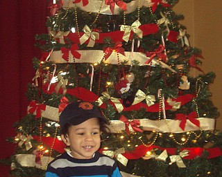 Jibril Jackson is the son of Jaietta Jackson of Youngstown, who points out the red and gold colors — Mooney colors!