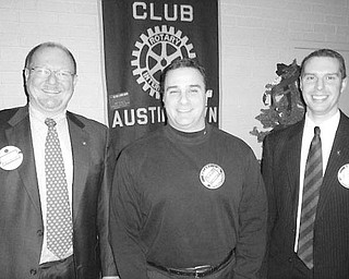 Special to The Vindicator
SOMETHING NEW: Vince Colaluca, superintendent of Austintown Schools, is flanked by Rotarian Chuck Baker, at left, and Brian Laraway, club president, following his induction into membership at the Jan. 4 meeting of the Rotary Club of Austintown. In addition to the installation ceremony, a program was presented by Deanna Hosey, owner of the Something Unique For You shop on Mahoning Avenue. Hosey was a high school exchange student to Japan through Austintown Rotary, sponsored by Dr. Murphy Morgan. She spoke of her efforts to make flowers affordable for everyone and of her recovery from a fire last year at her shop.