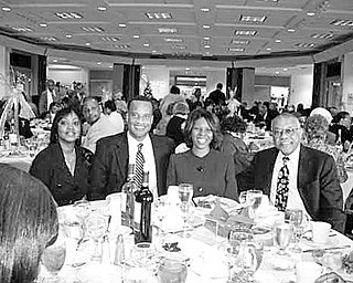 Special to The Vindicator
GIVE AND TAKE: Youngstown Links Inc. asked each invited guest to take a toy to its eighth annual Gift Giving Luncheon on Dec. 6 at Fellows Riverside Gardens. The toys were donated to worthy organizations for distribution to children during the holidays. Those accepting the donated items were the Rev. Hosea Ekong for the Operation Learning Community Program, Dr. Ruth Quarles for Women Hand In Hand, and Doug Wentz for Safe House, Phoenix Court and Emory House operated by Meridian Services. Among the 200 guests in attendance, are, above from left, Margaret Staples, social chair; Mayor Jay Williams and his wife, Sonja; and Charlie Staples.