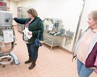 Tammy Swank, and mother, Gloria Damron, inspect a new kitchen area at the MCCTC on Sunday afternoon. Tammy's son, Ryan, has been enrolled at MCCTC for two years currently studying horticulture and carpentry but may also take culinary classes.