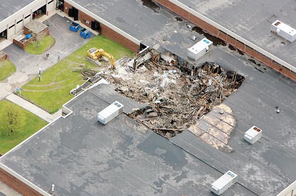 DAMAGE: An aerial view shows extensive damage a fire in May 2007 caused to the Mahoning County Career and Technical Center. The center dedicated renovations and a new wing at the school Sunday.