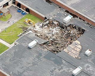 DAMAGE: An aerial view shows extensive damage a fire in May 2007 caused to the Mahoning County Career and Technical Center. The center dedicated renovations and a new wing at the school Sunday.