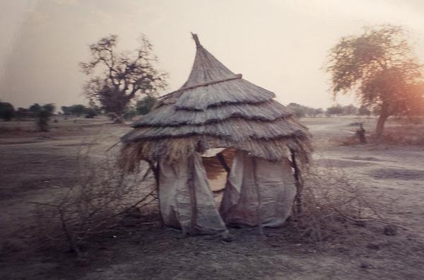 Mirian Harvey in Sudan while working for the UN's World Food Program in Sundan, Eritrea, and Kenya from 1998-2001. "You don't miss that part of it, like putting tablets in water," said Harvey as she looked a small temporary hut used as a toliet, "you miss seeing the peoples faces when you help them."